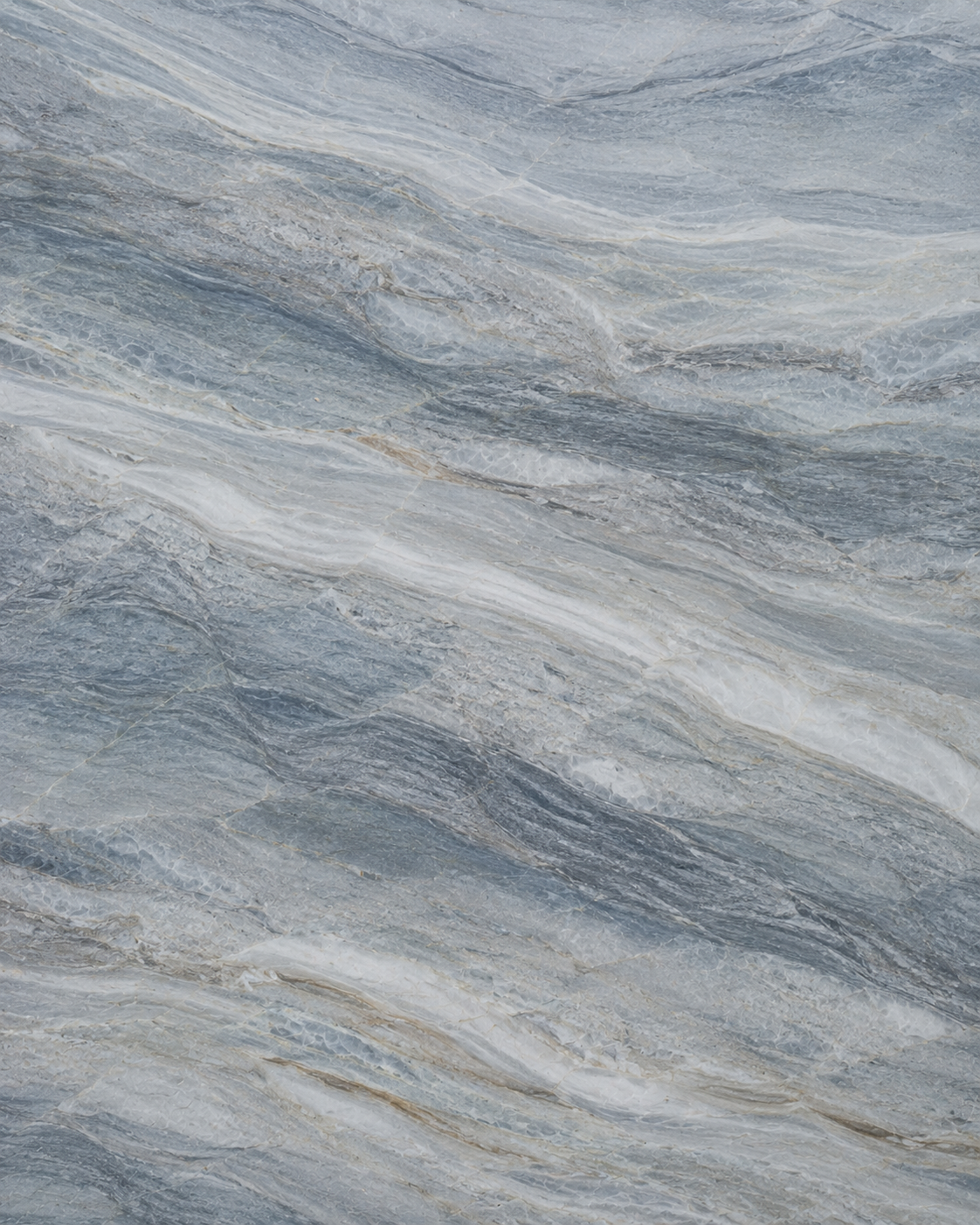 Quartzite Countertops South Florida | King of Quartz 16 Authentic Sea Pearl Quartzite slab with flowing blue-gray, silver, cream, and white movement, popular for luxury kitchen countertops, waterfall islands, feature walls, and coastal-inspired interiors throughout South Florida.