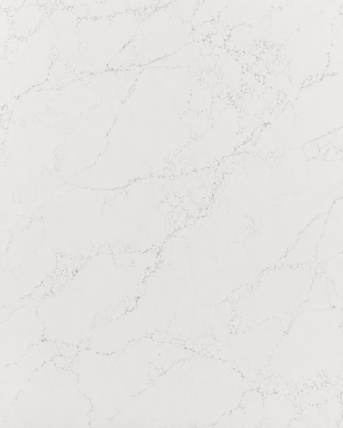 Close-up texture of Viatera white quartz featuring soft gray veining, bright white background, and a clean natural stone-inspired appearance suitable for luxury kitchen and bathroom countertops.